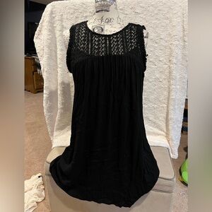 Women’s sleeveless black dress